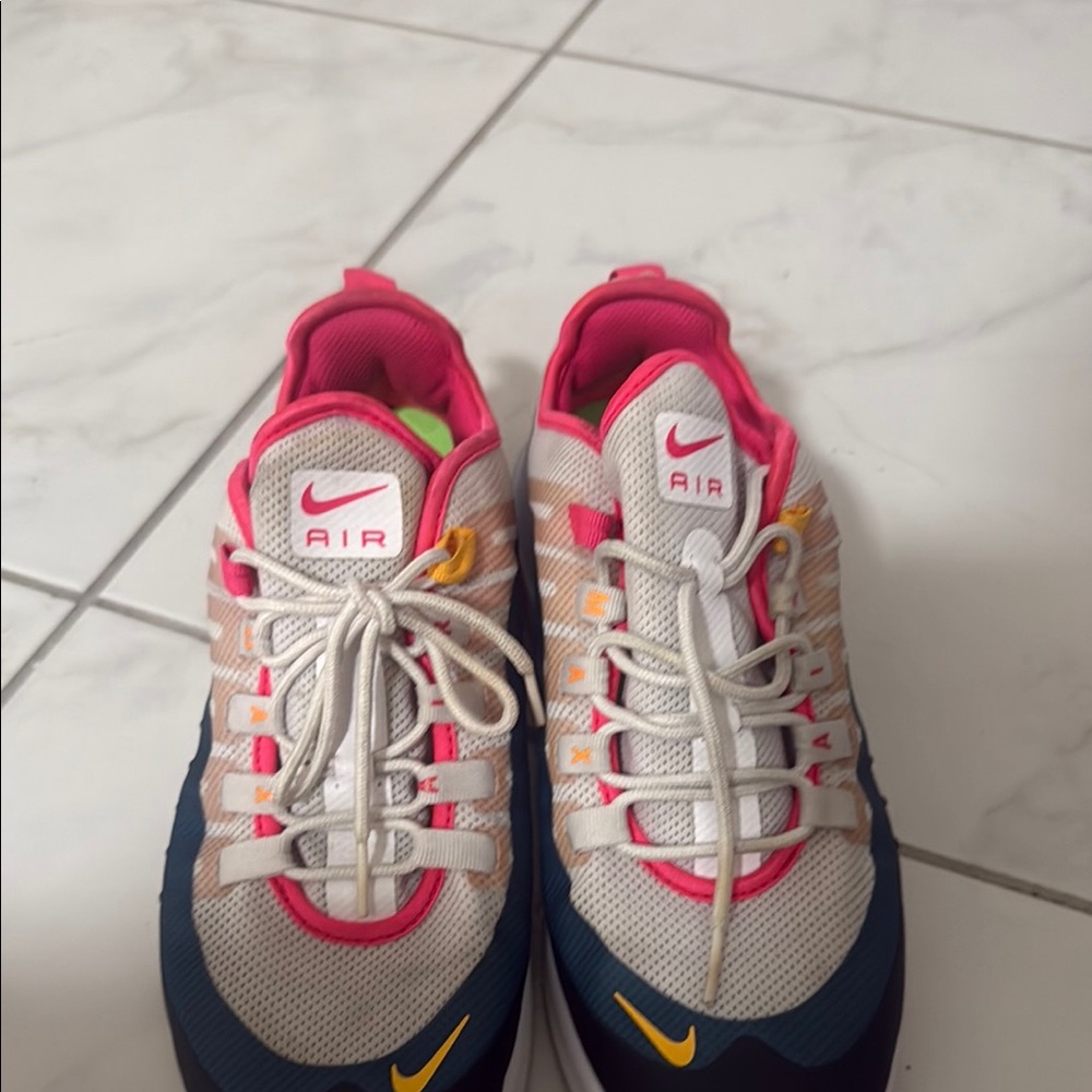 Nike Air Sneakers with Pink and Blue Accents